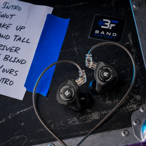 KZ EDX Pro X in-ear monitors — Band Factory touring flight-case flat lay