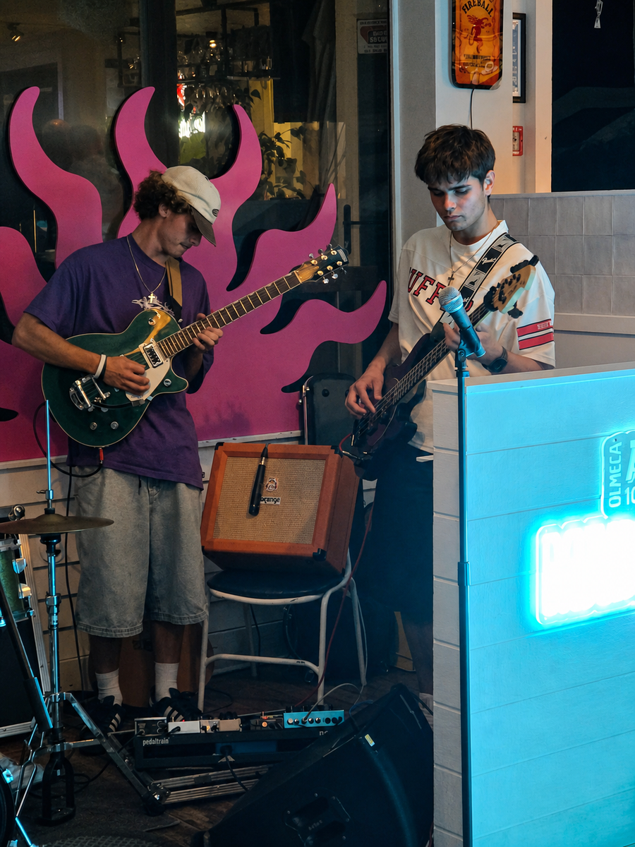 Spottie guitarists performing at Beach Bar Papamoa